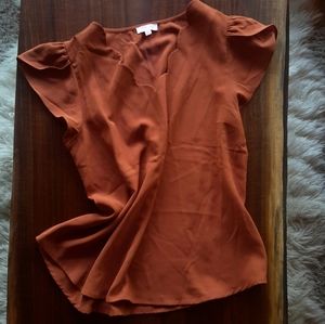 Burnt orange blouse